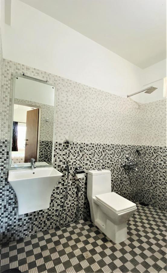 White Shell Beach House Каннур Екстер'єр фото