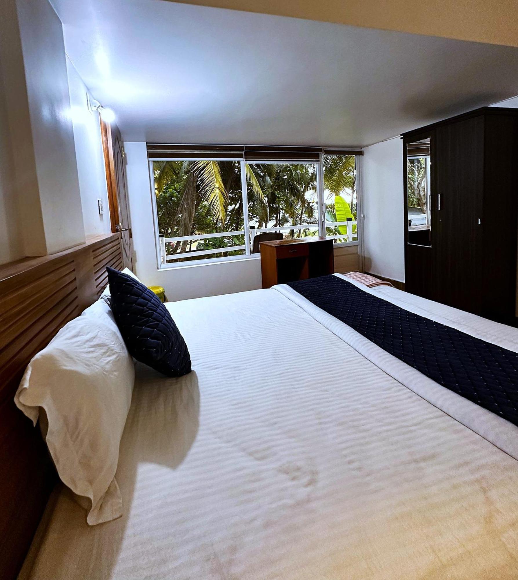White Shell Beach House Каннур Екстер'єр фото